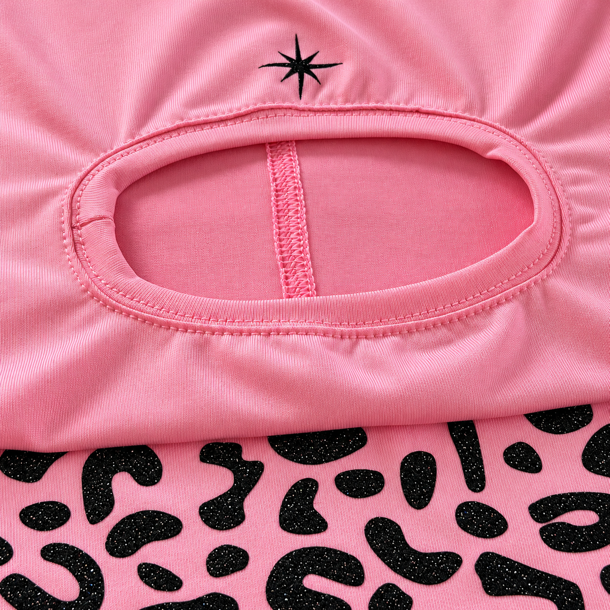 Close-up of Brisa Ride balaclava with glitter leopard star