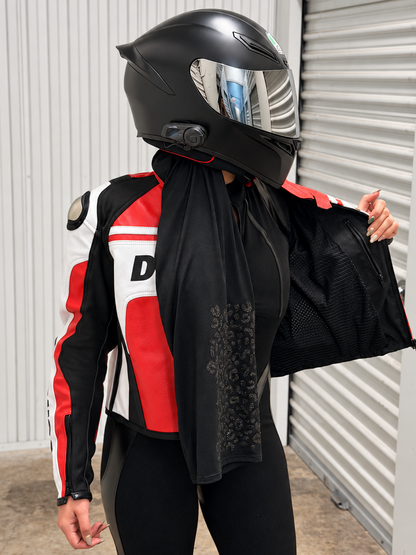 Editorial portrait of a rider in her helmet wearing Brisa Ride
